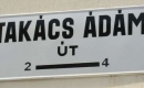 Takács Ádám református tiszteletesről elnevezett utca táblája 